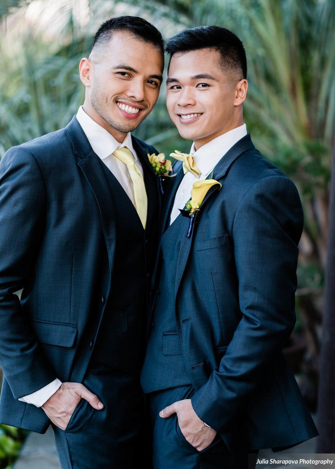 wedding picture of young gay couple wearing blue suits from generation tux