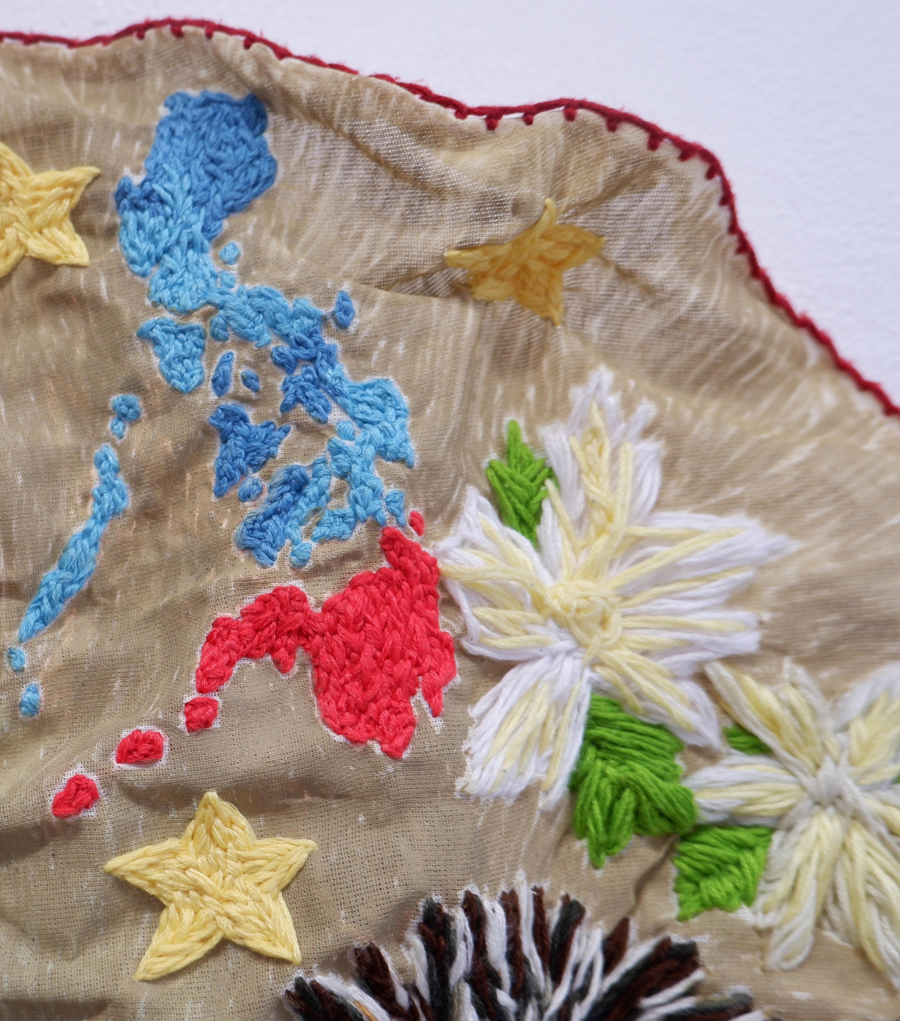 Map and national flower embroidery detail