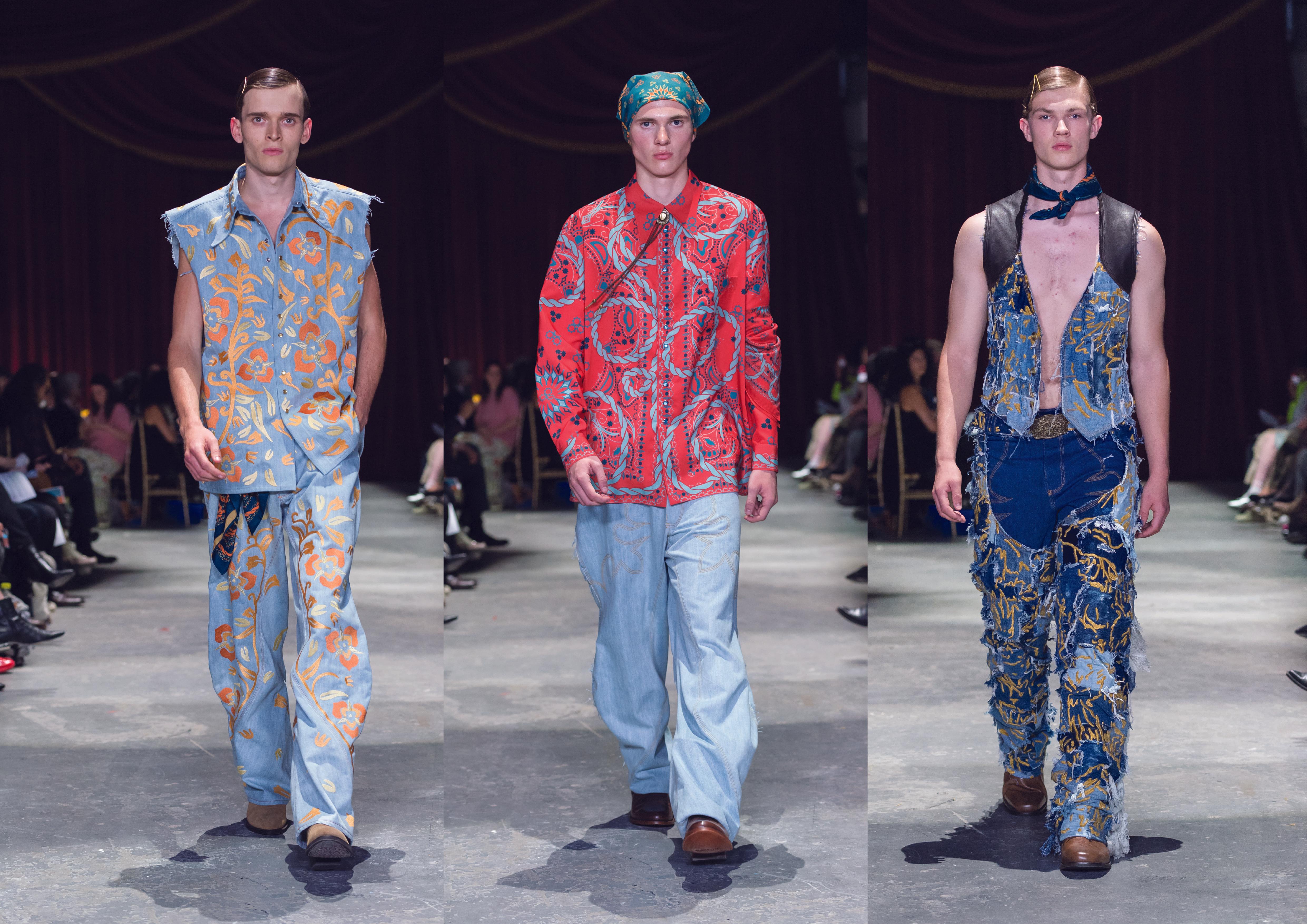 Three menswear runway looks from Elise Cullen's graduate collection presented side by side. The first features a light blue sleeveless shirt and wide-leg jeans with oversized embroidered floral motifs in orange and cream. The second combines pale blue jeans with a vivid pink patterned shirt and matching bandanna. The third features distressed patchwork denim trousers and a matching vest with frayed detailing, styled with a bandanna and brown boots. The looks combine bold prints, experimental textiles, and references to Western dress.