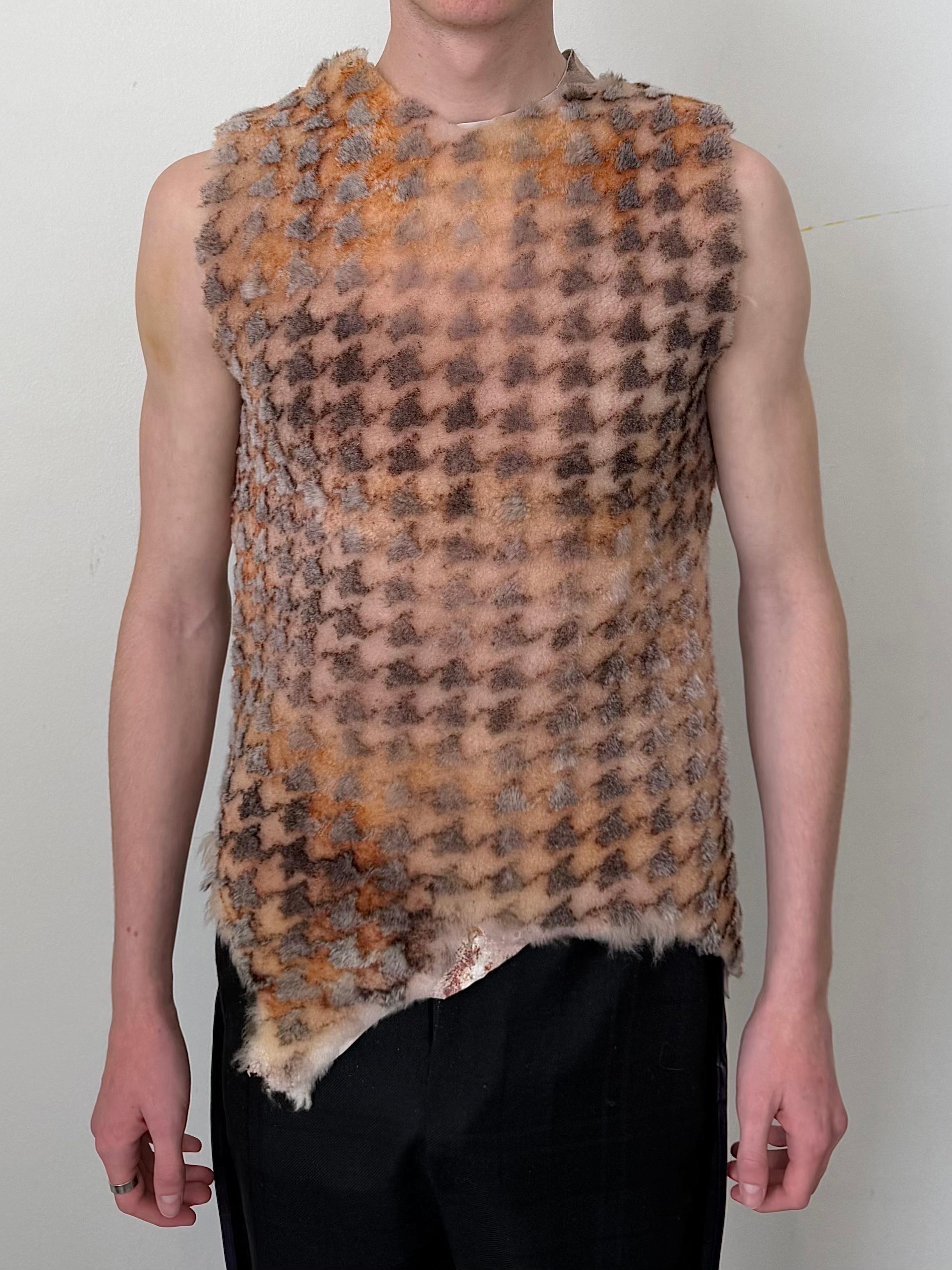 Laser engraved houndstooth shearling vest