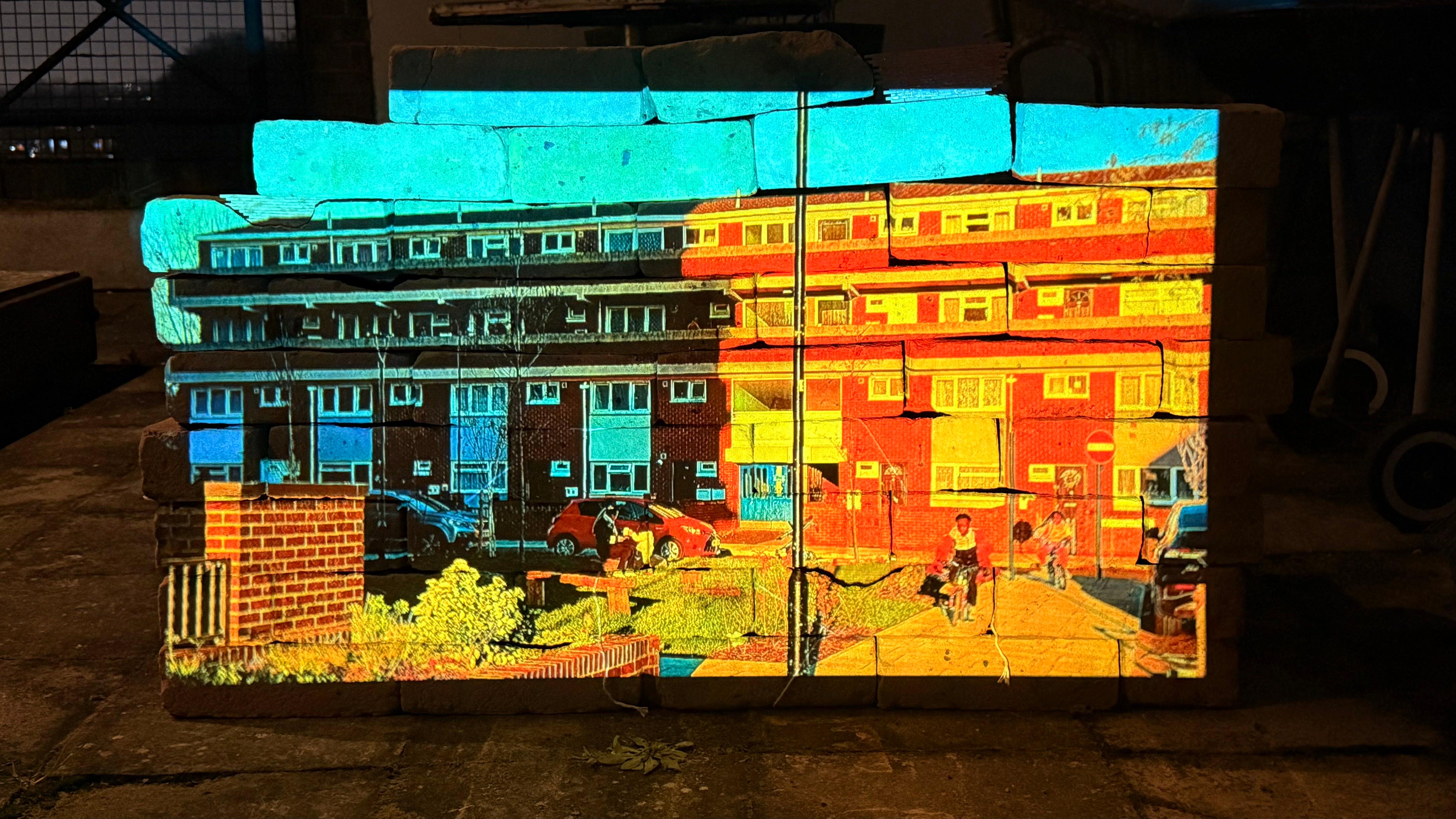 Custom House Image Projected on Salvaged Bricks