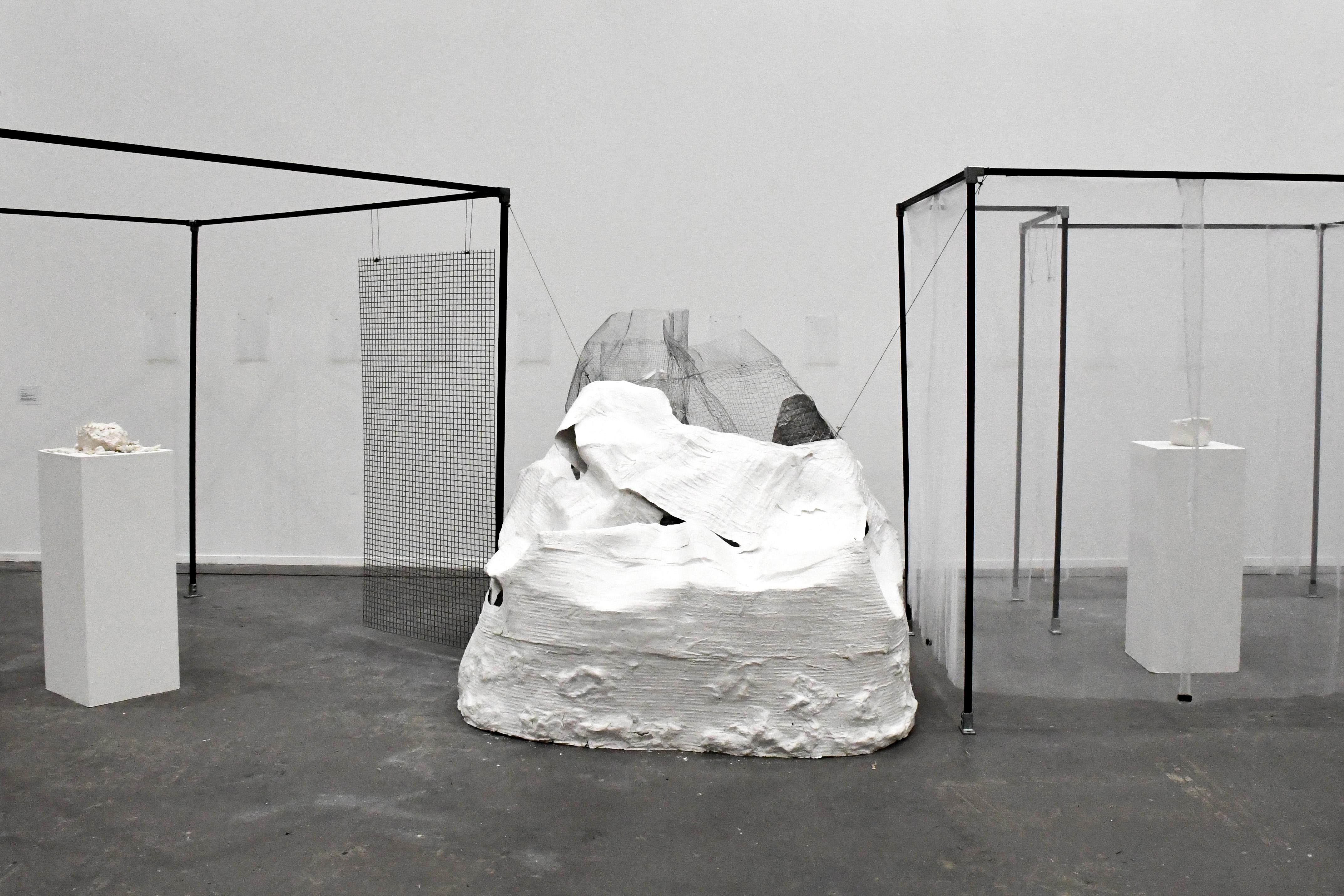 Clear, 2026. Steel, wire mesh, wire grids, wire rope, acrylic sheets, fabric, plaster, plaster wrap, clay, acetate sheets. Ambika P3, London. Installation view.