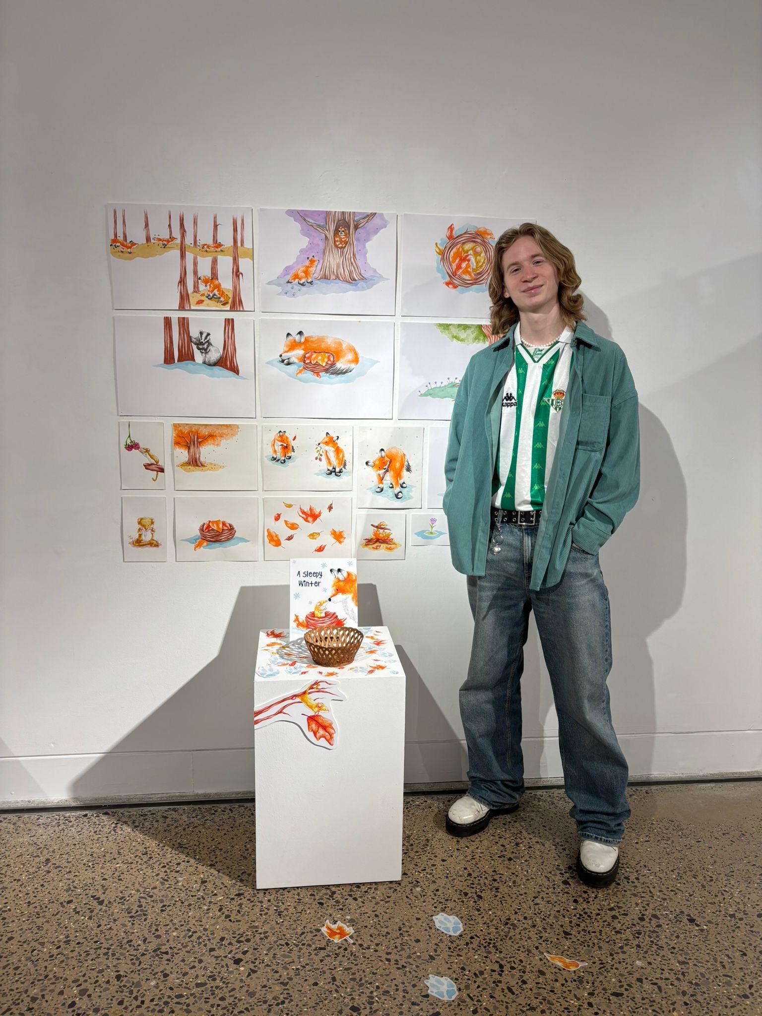 Me standing with my display at the degree show