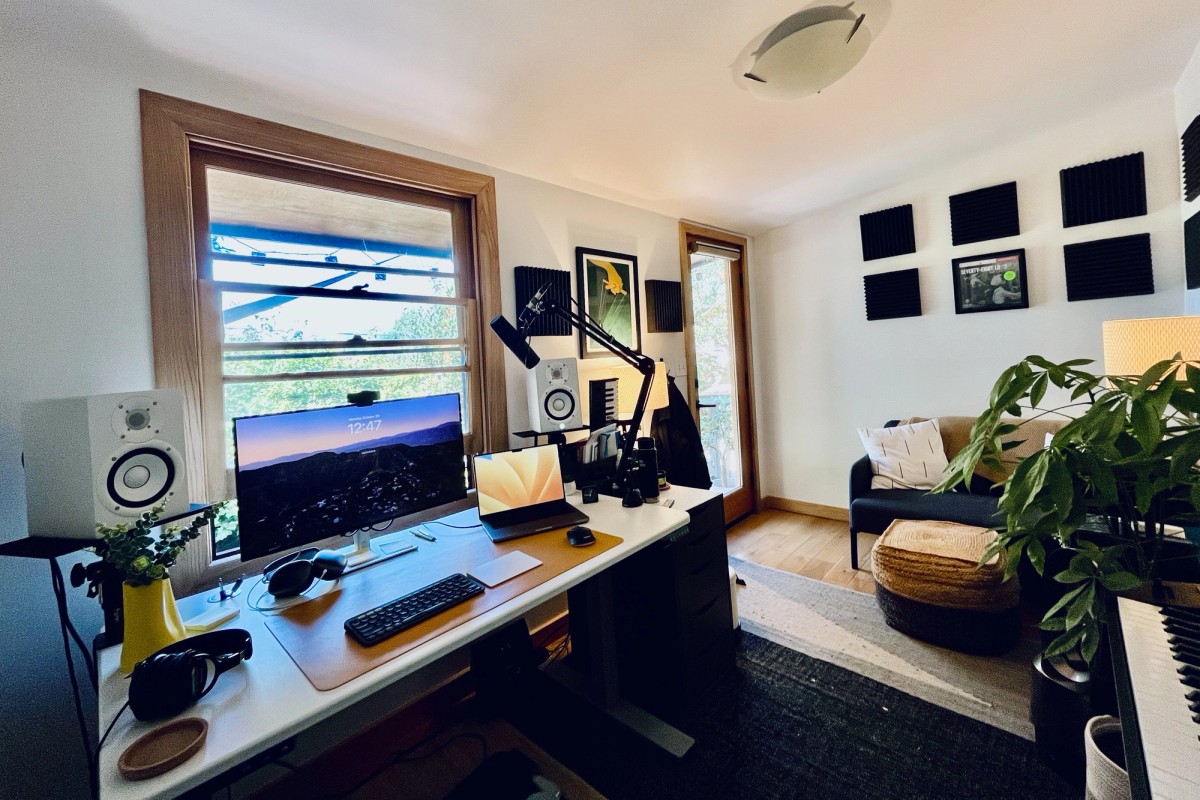 Patrick Morgan home office and recording studio with Yamaha HS5 monitors, Shure SM7B microphone on boom arm, and acoustic treatment panels