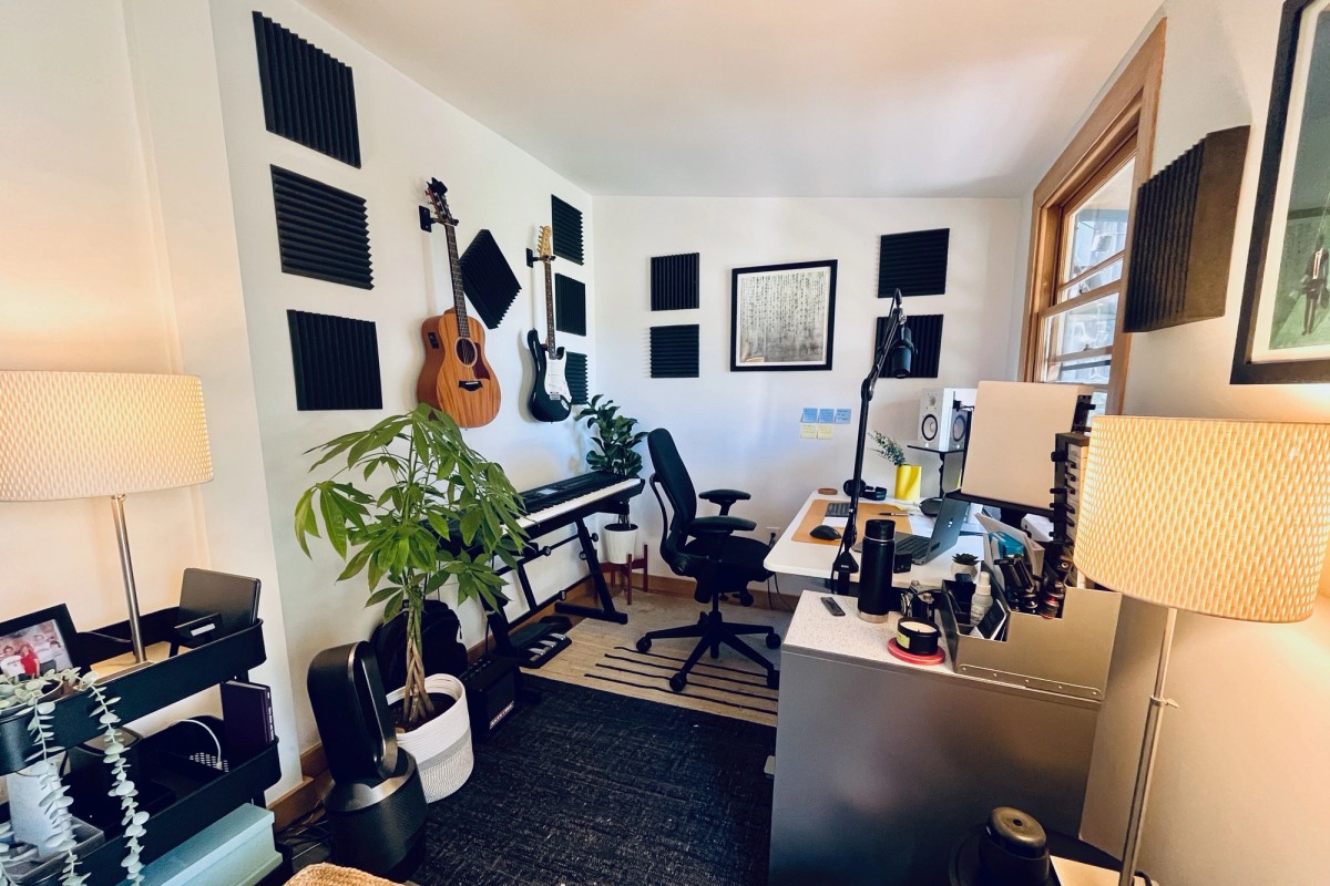Patrick Morgan music room with Fender Stratocaster, Taylor GS Mini acoustic guitar, Roland RD-800 piano, and acoustic treatment panels