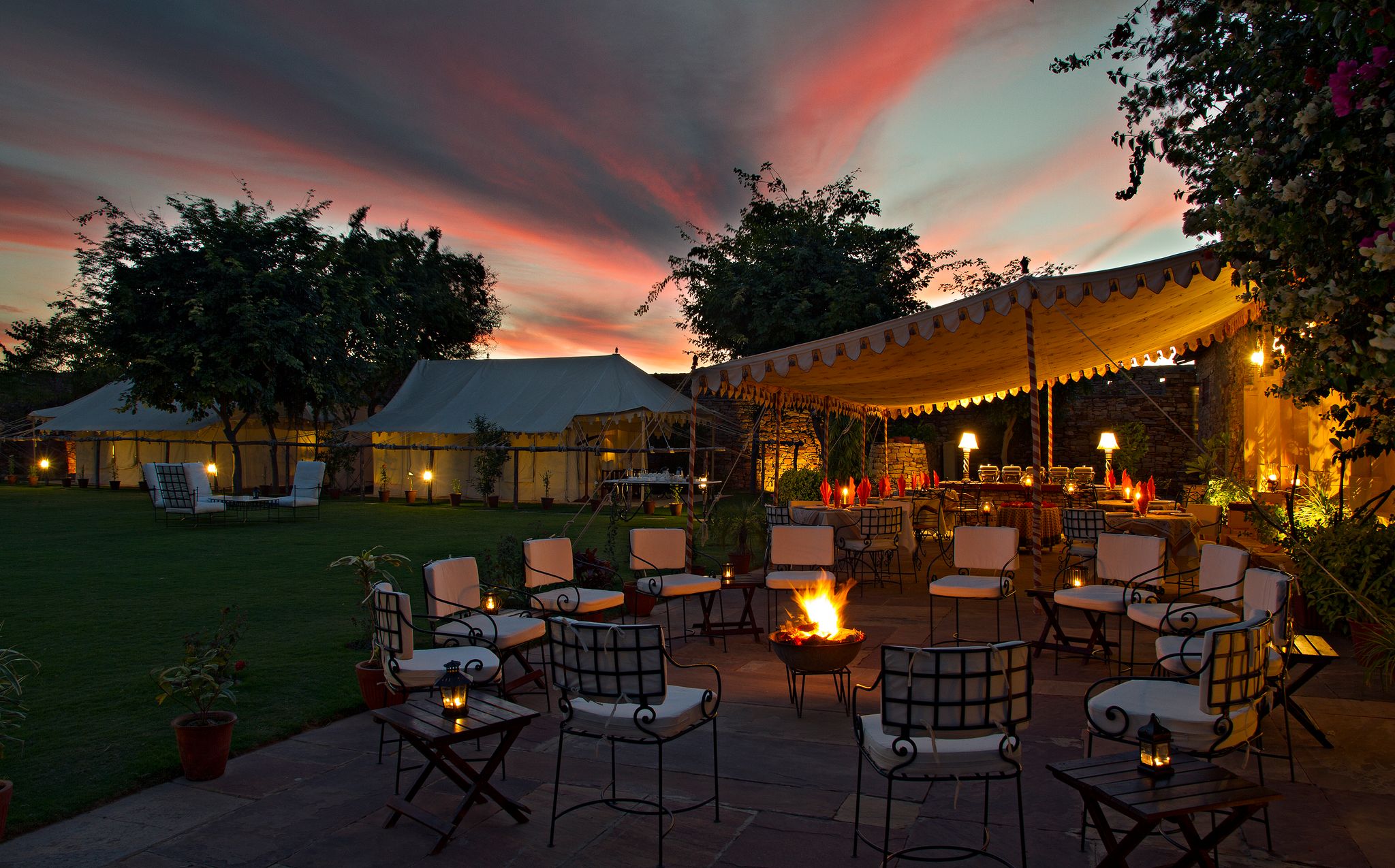 Fireside outdoor seating at dusk