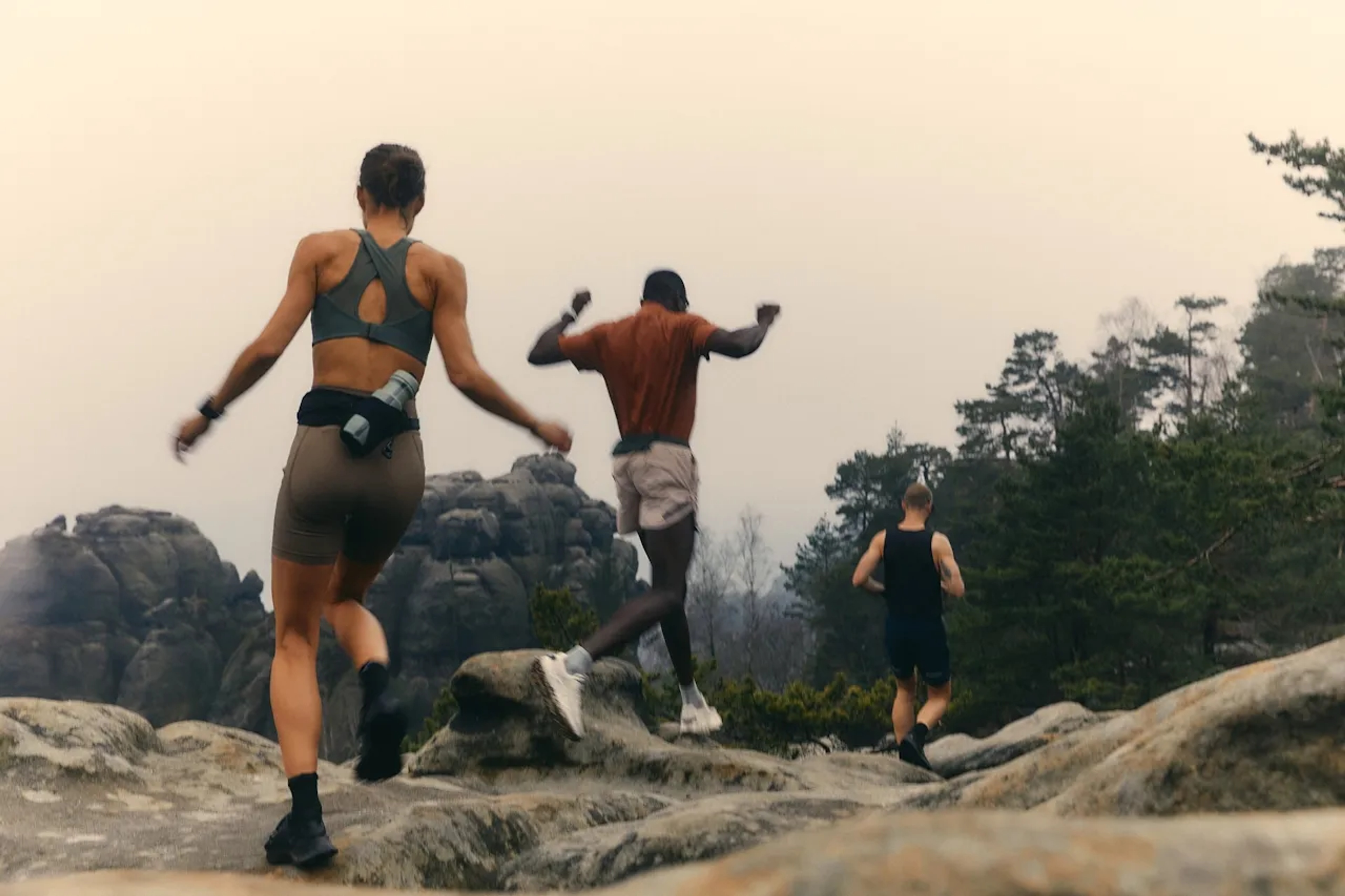 people running on rocks