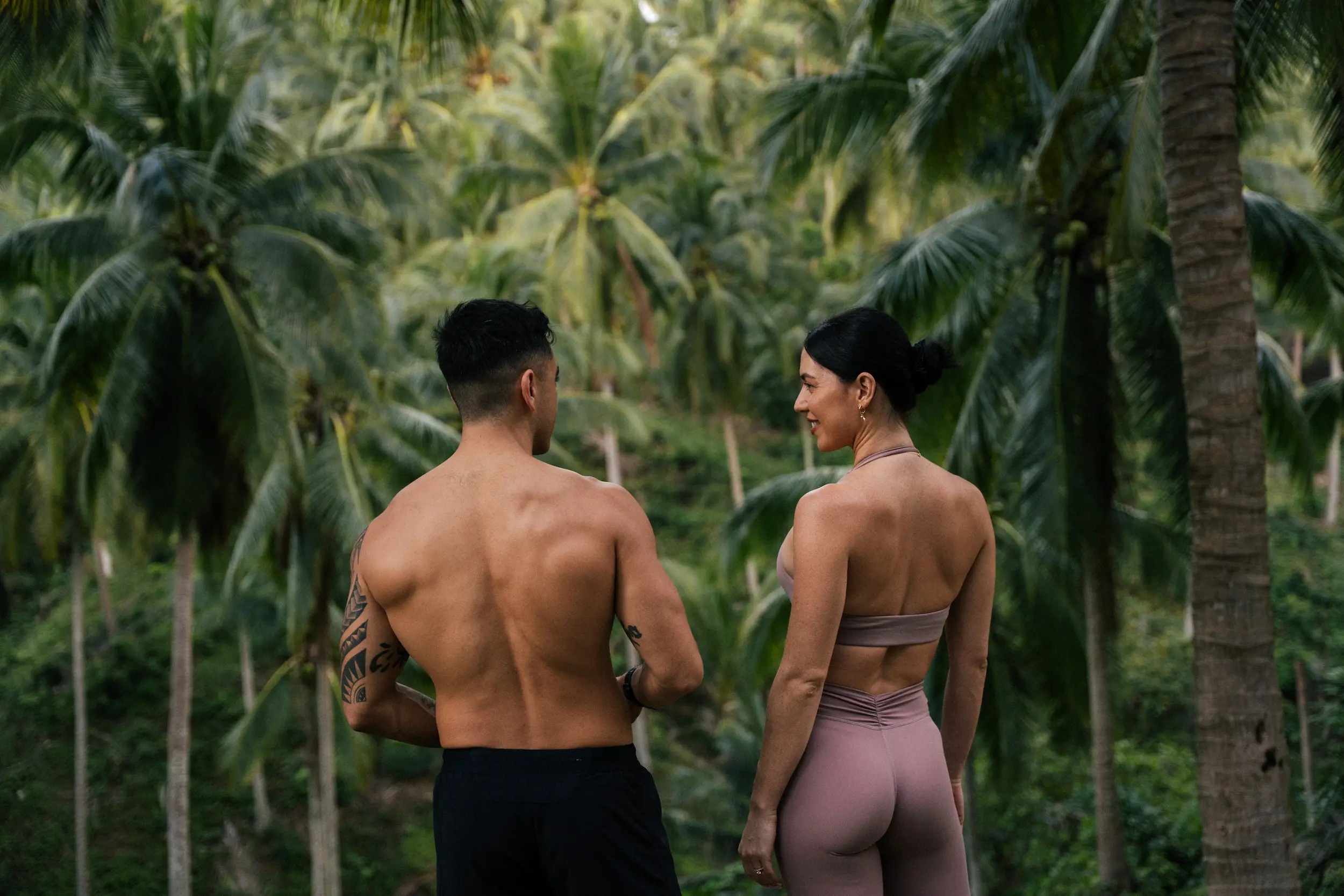 two fit people in the rainforest