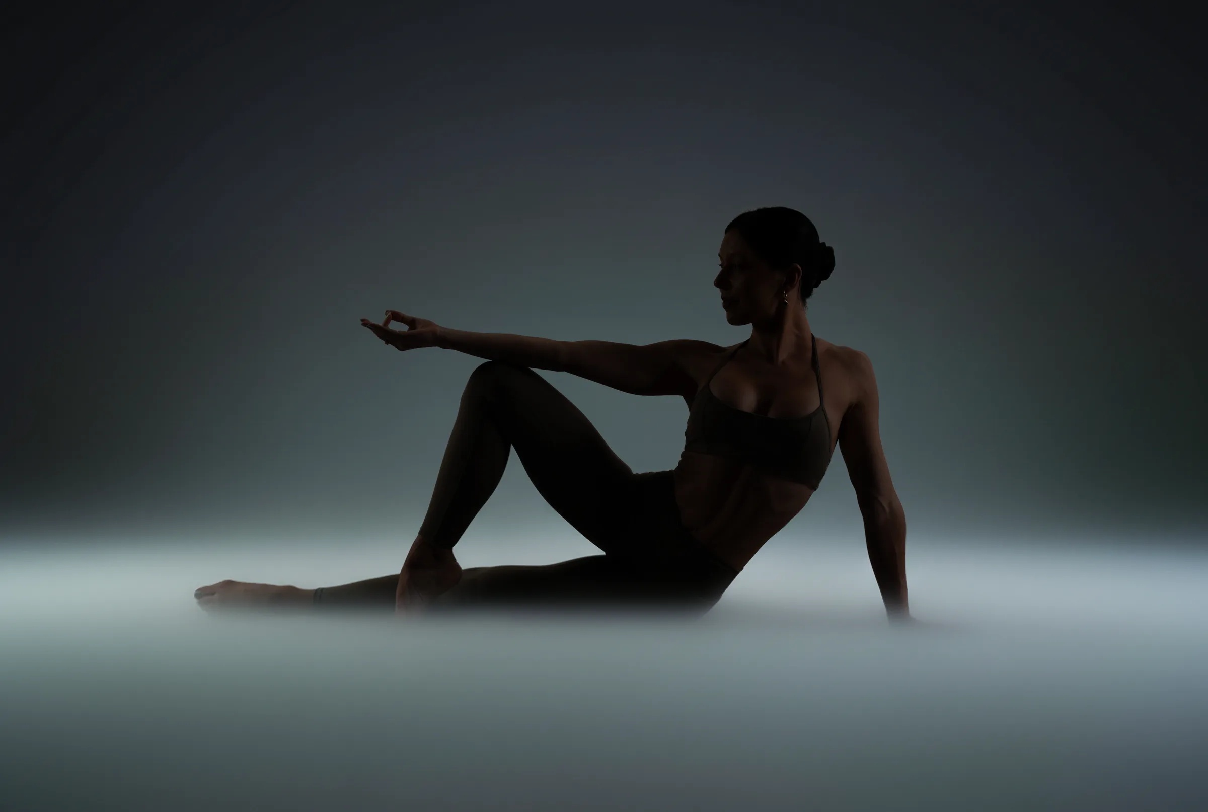 Nicole coaching a mat Pilates session