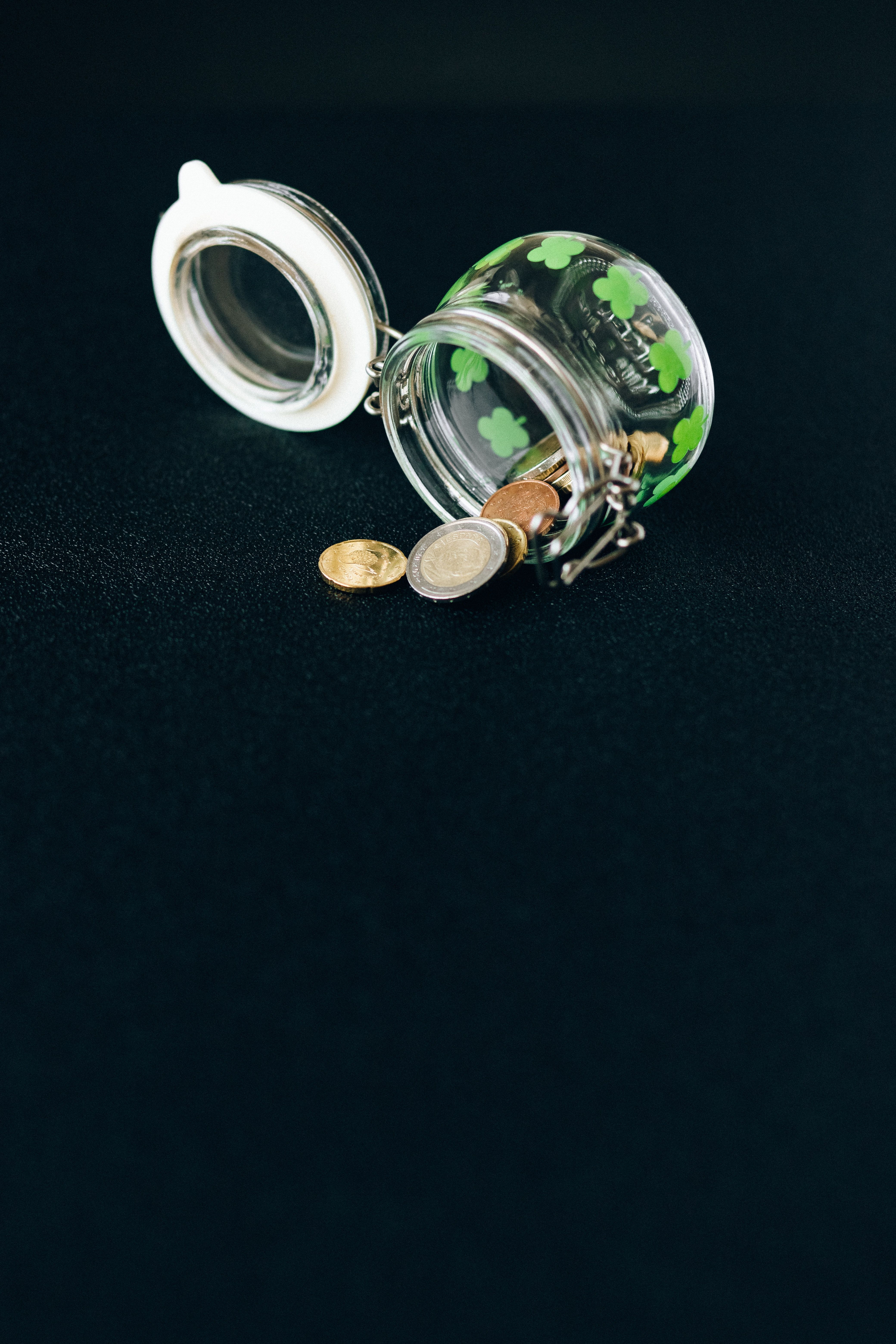 Coins falling off a jar