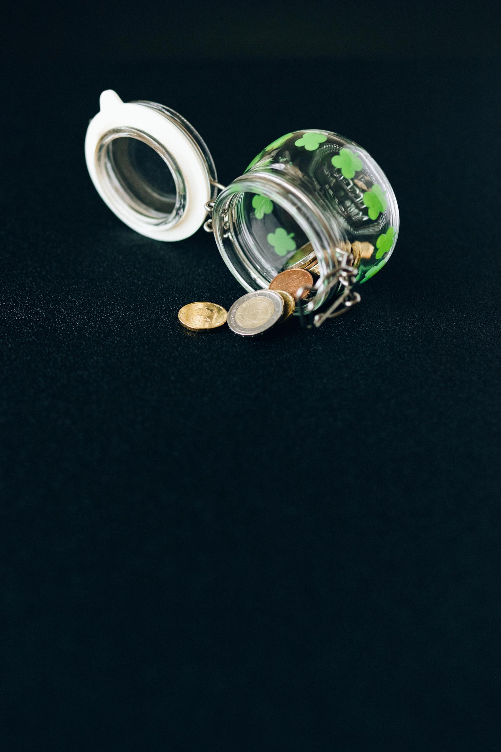 Coins falling off a jar