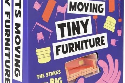 Giants Moving Tiny Furniture