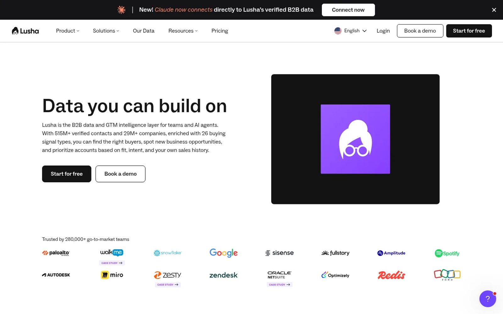 Lusha homepage headline "Data you can build on", with its 515M+ contacts and 29M+ companies claim and a banner about connecting Claude