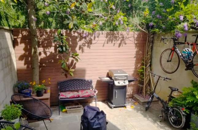 Cozy urban backyard renovation in historic Georgetown, Washington, DC rowhouse