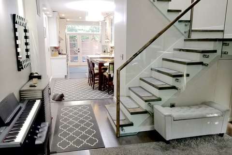 Washington, DC Georgetown townhouse main floor with kitchen and stairs view from living room