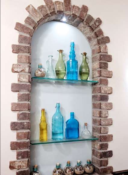 Troika Restaurant display nook with bottles