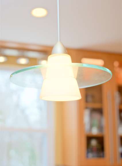 Contemporary pendant lighting design detail in new Howard County kitchen
