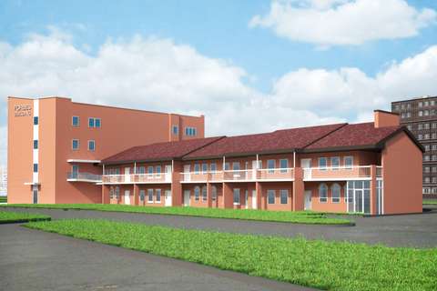 New Forbes Building side view with existing two-story office building