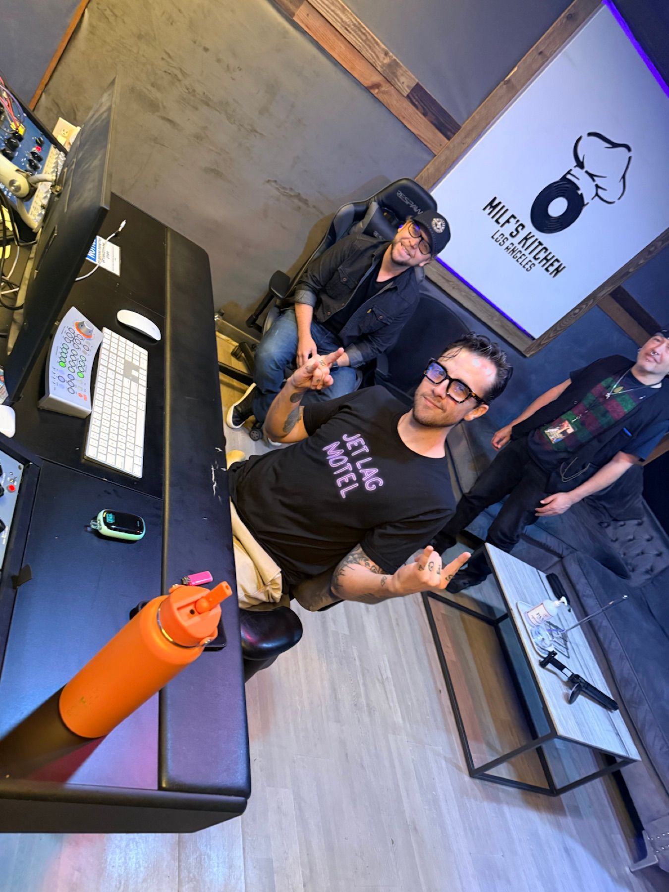 The band and Nathan Bankston working in The Kitchen LA control room