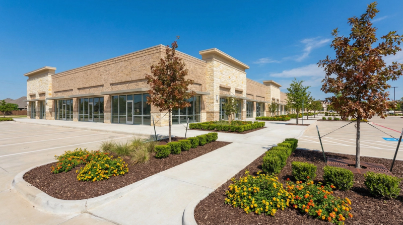 True Star crew trimming hedges at commercial property