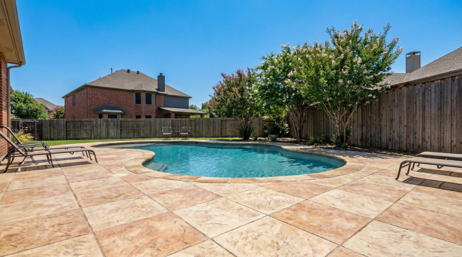 A coated pool deck. Built by True Star Outdoor Solutions.
