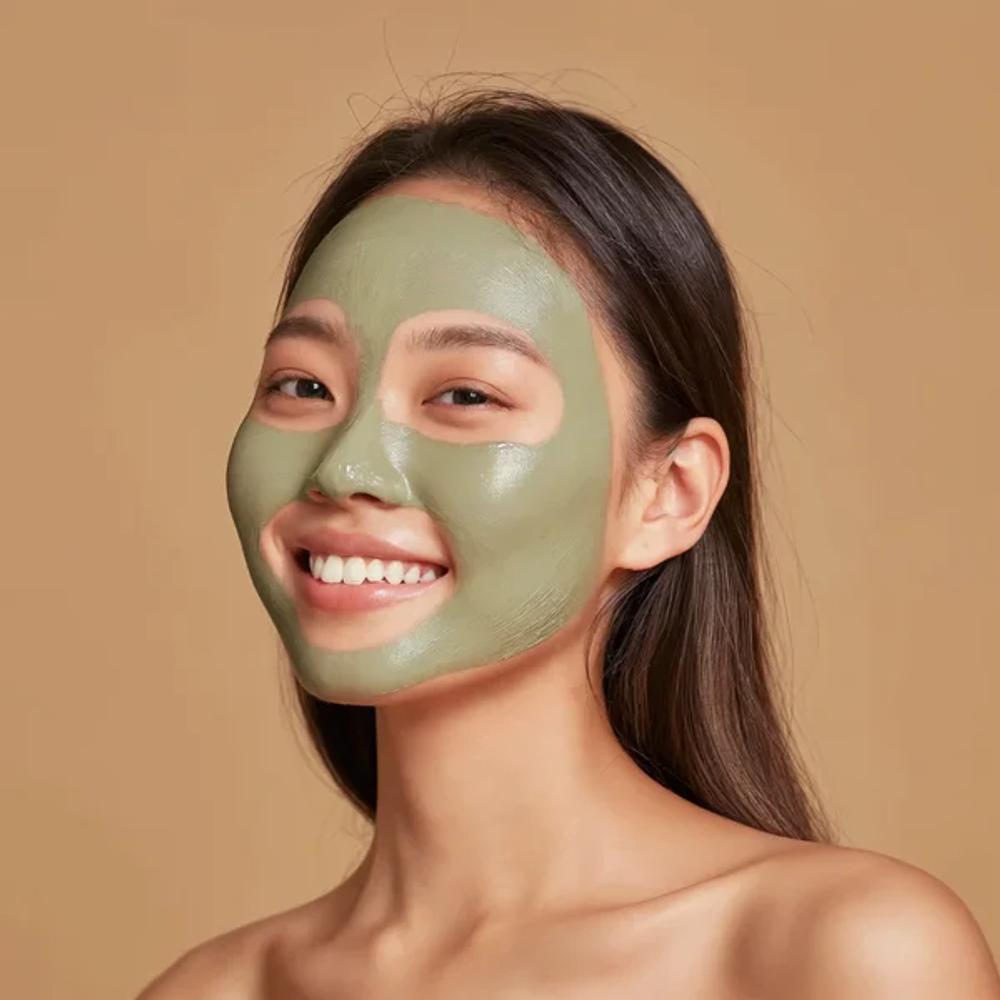 Keauty skincare campaign with a woman wearing a green face mask