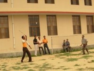 Students playing on the college sports ground
