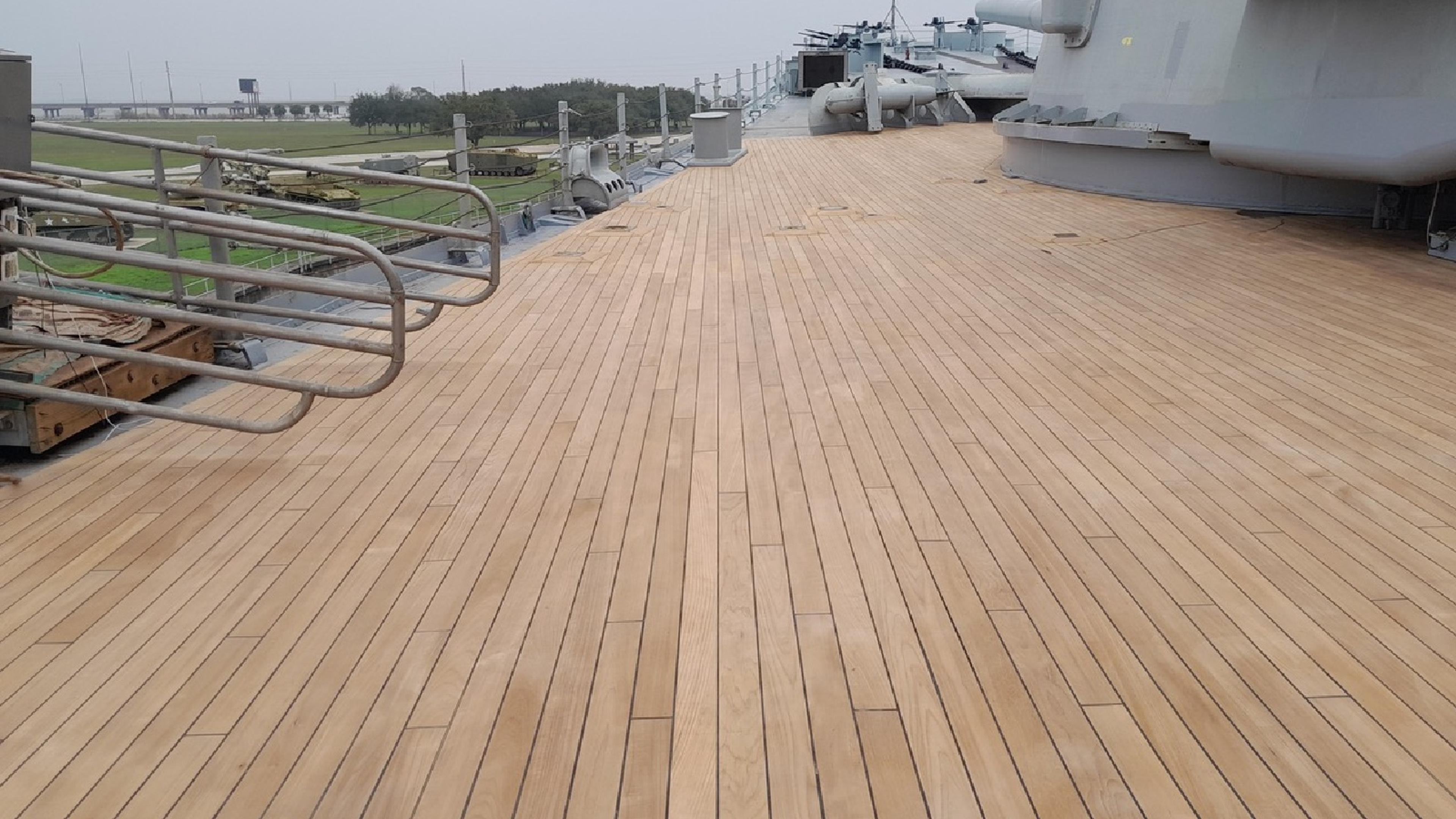 the deck of the USS Alabama with new teak decking