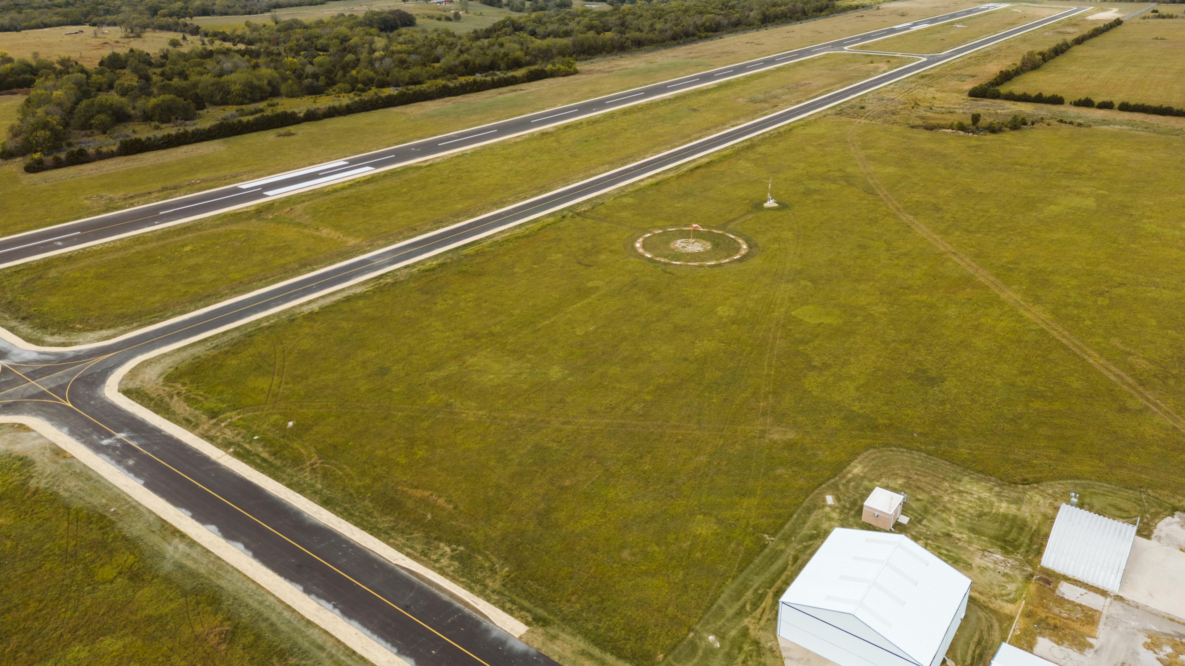 an aerial shot of the runway at Fort Scott Municipal Airport in Kansas