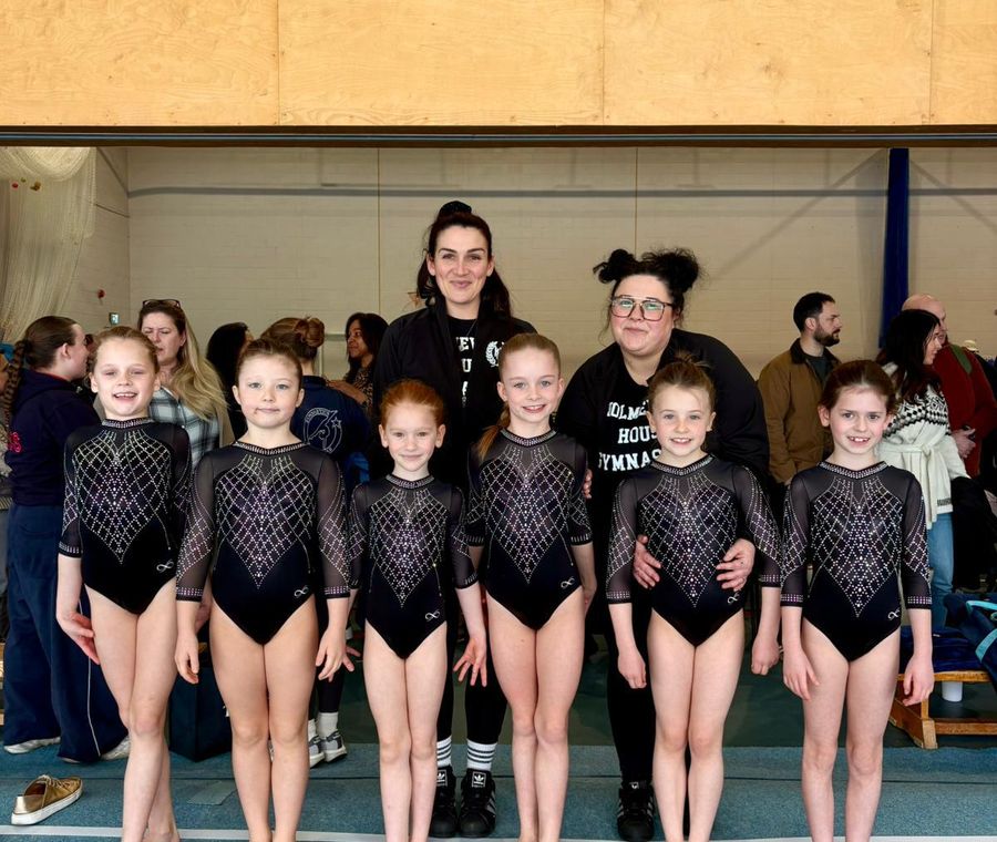 A coach with her squad