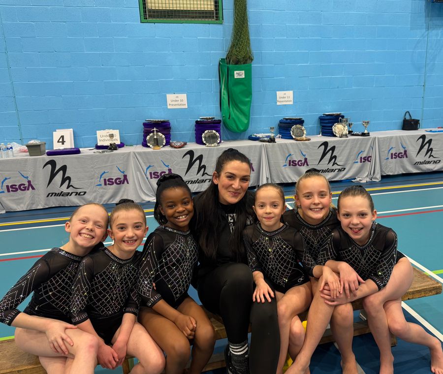 A coach with her squad