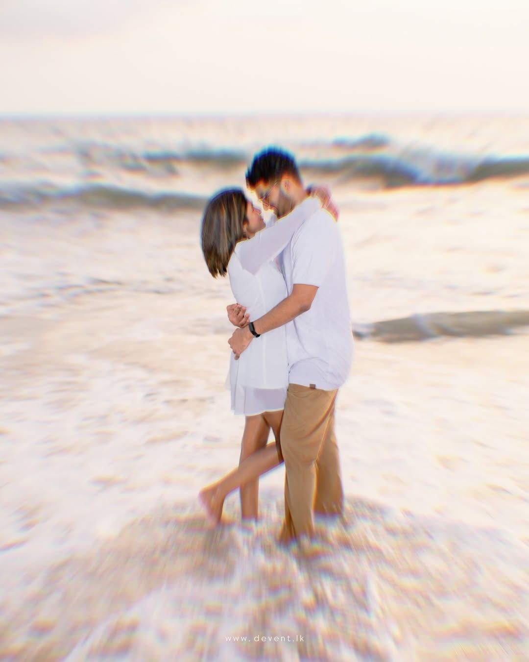 Romantic couple embracing on beach after engagement Sri Lanka emotional intimate moment