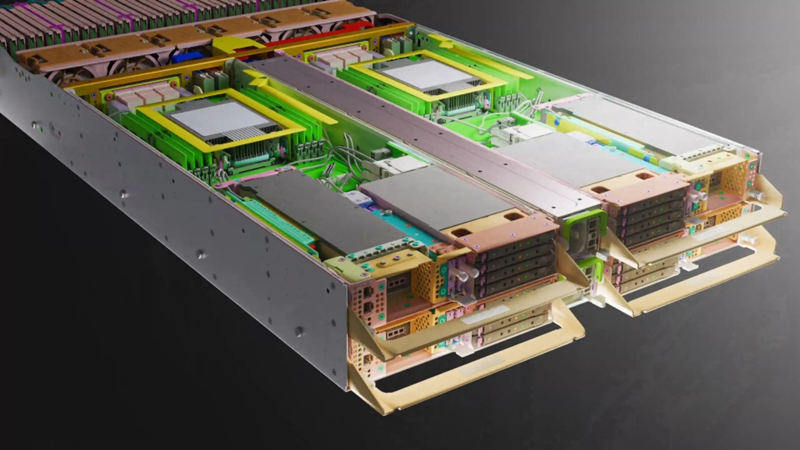 Internal view of a multi-module server or computing unit with its top removed, revealing circuit boards, heatsinks, and fans.