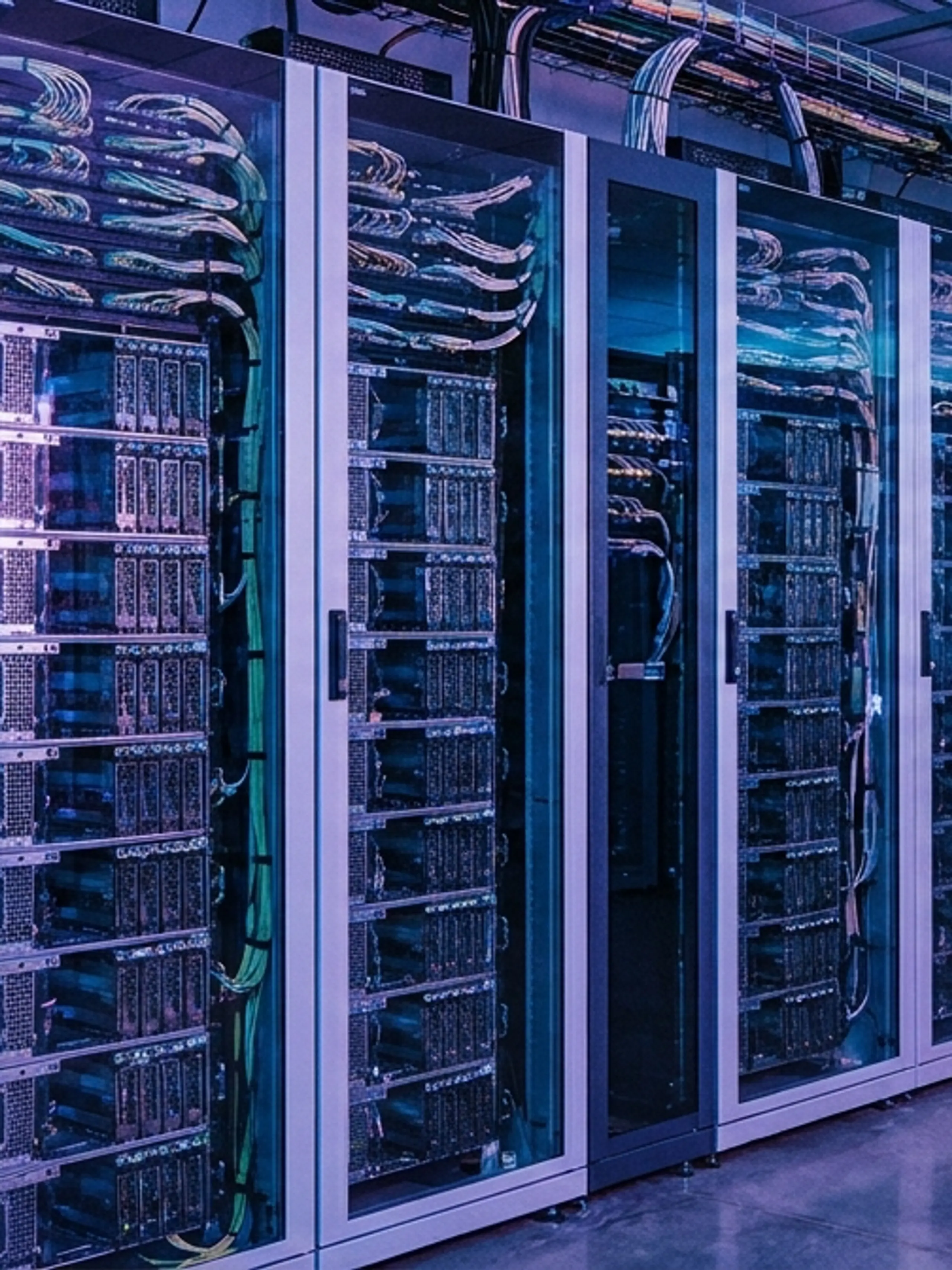 A long row of server racks in a modern data center.
