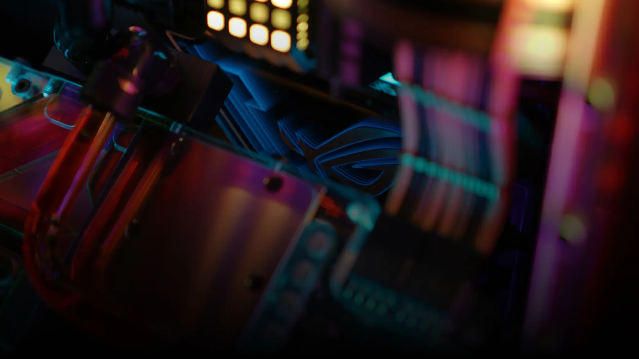 Red liquid cooling tubes, and colorful RGB lighting.