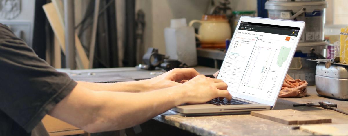 Glazier designing glass on an online ordering portal