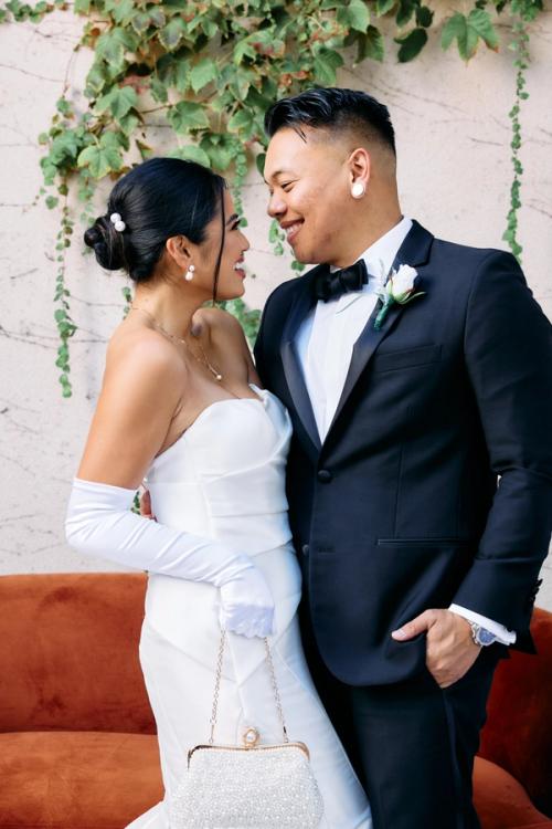 Wedding couple portrait against ivy wall backdrop — The Lounge Booth Los Angeles