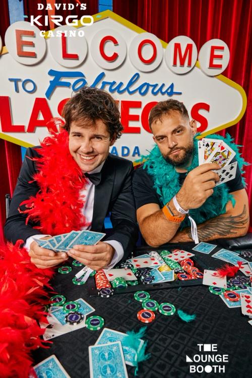 Guests at a Las Vegas themed casino party photo setup — The Lounge Booth