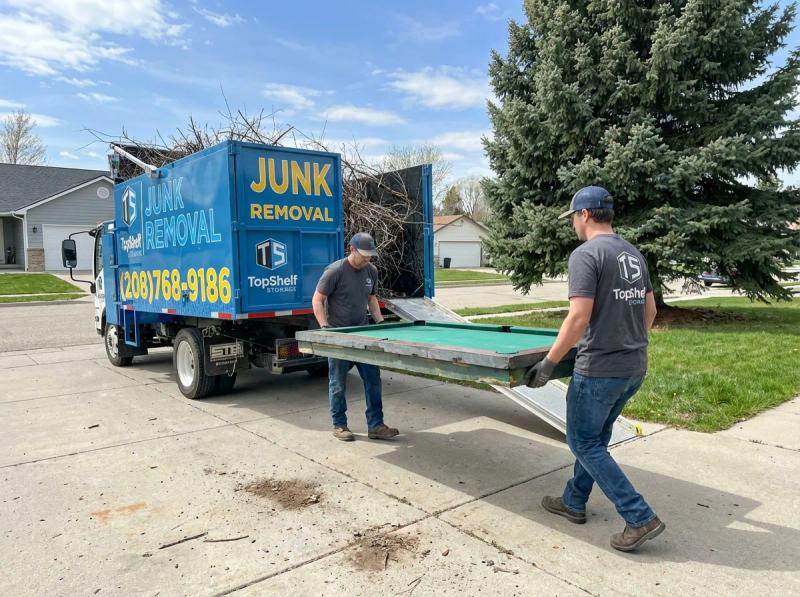 Top Shelf crew removing a pool table from a game room in Emmett Idaho