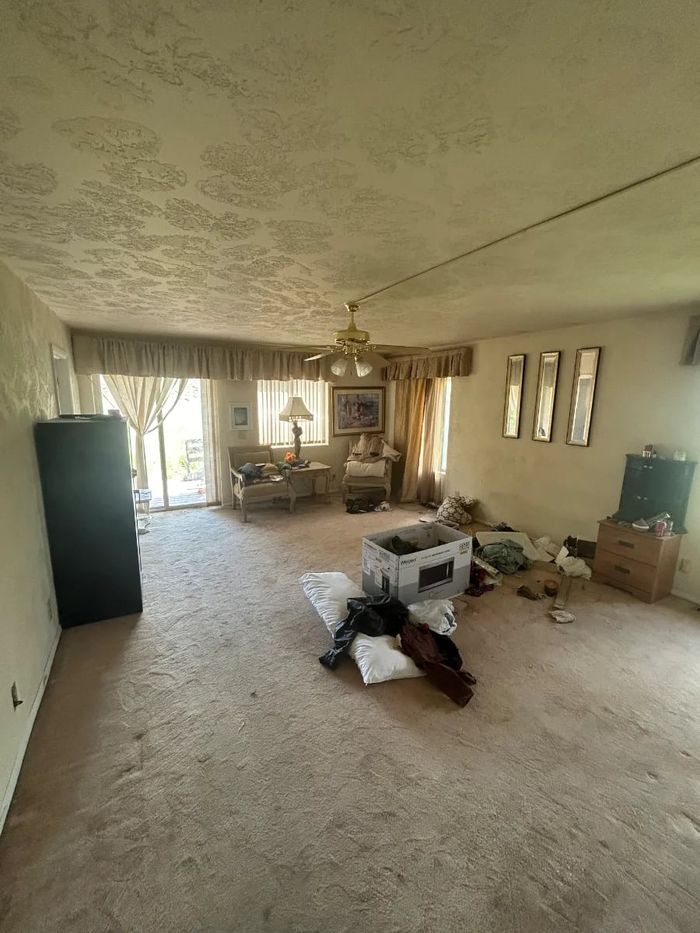 Empty, swept living room after a full property cleanout