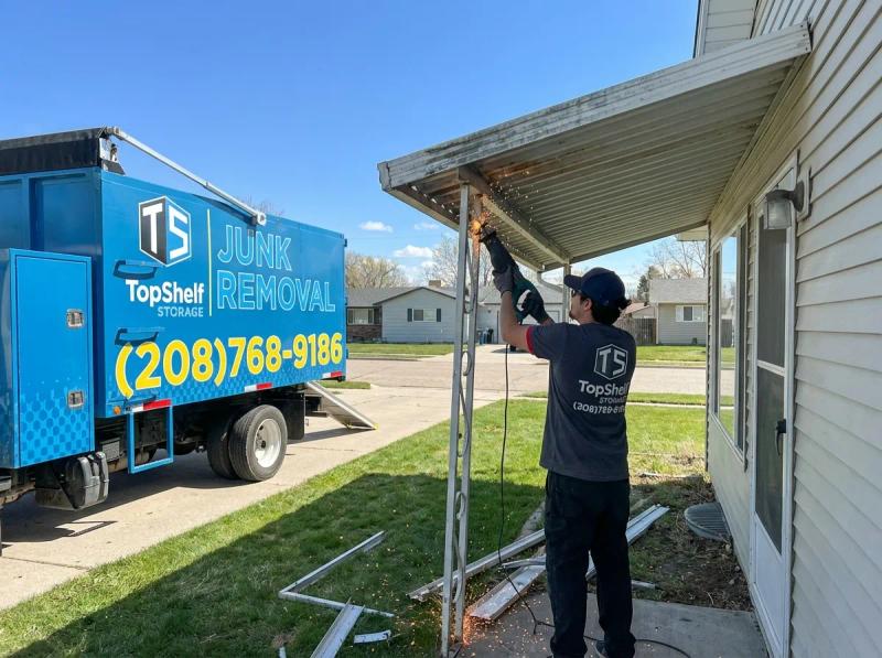 Lean-to demolition by Top Shelf crew at a property in Caldwell Idaho