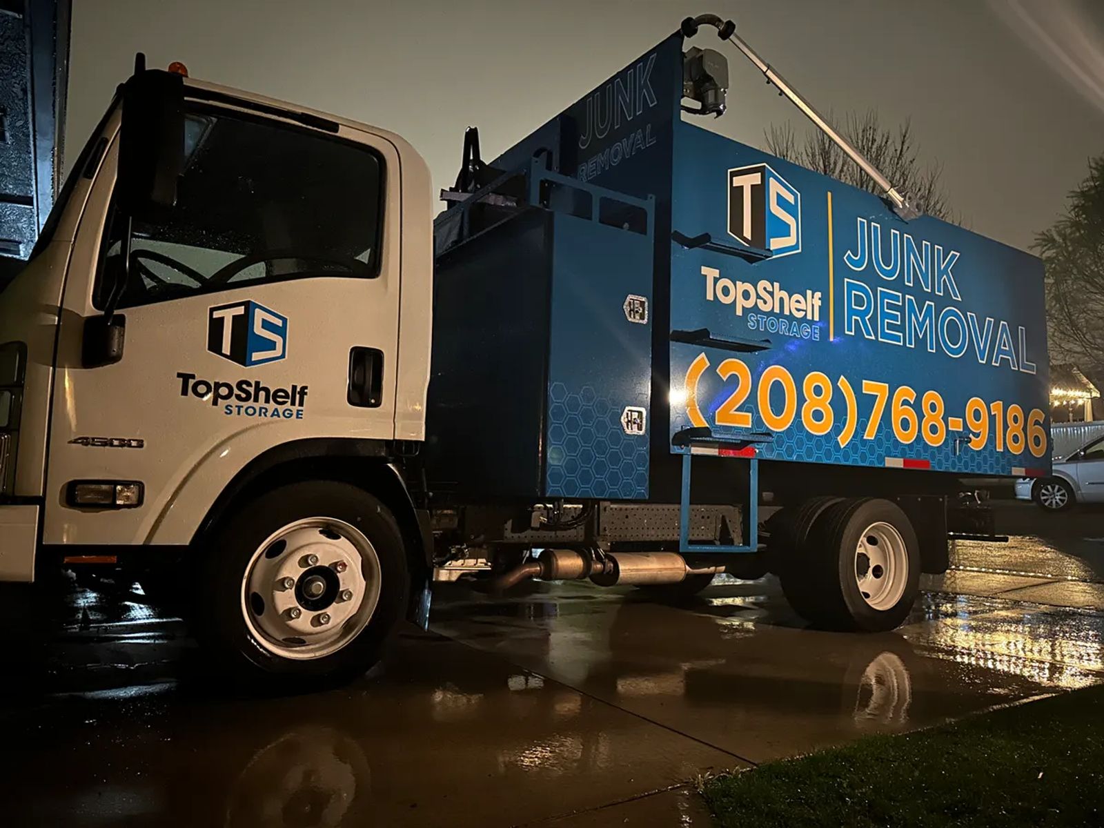 Top Shelf junk removal truck on site for an evening drywall debris pickup in Meridian Idaho