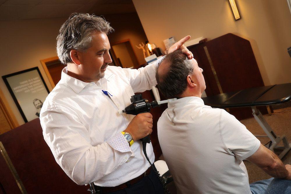 Chiropractic neck adjustment for cervical spine alignment in Minot, ND