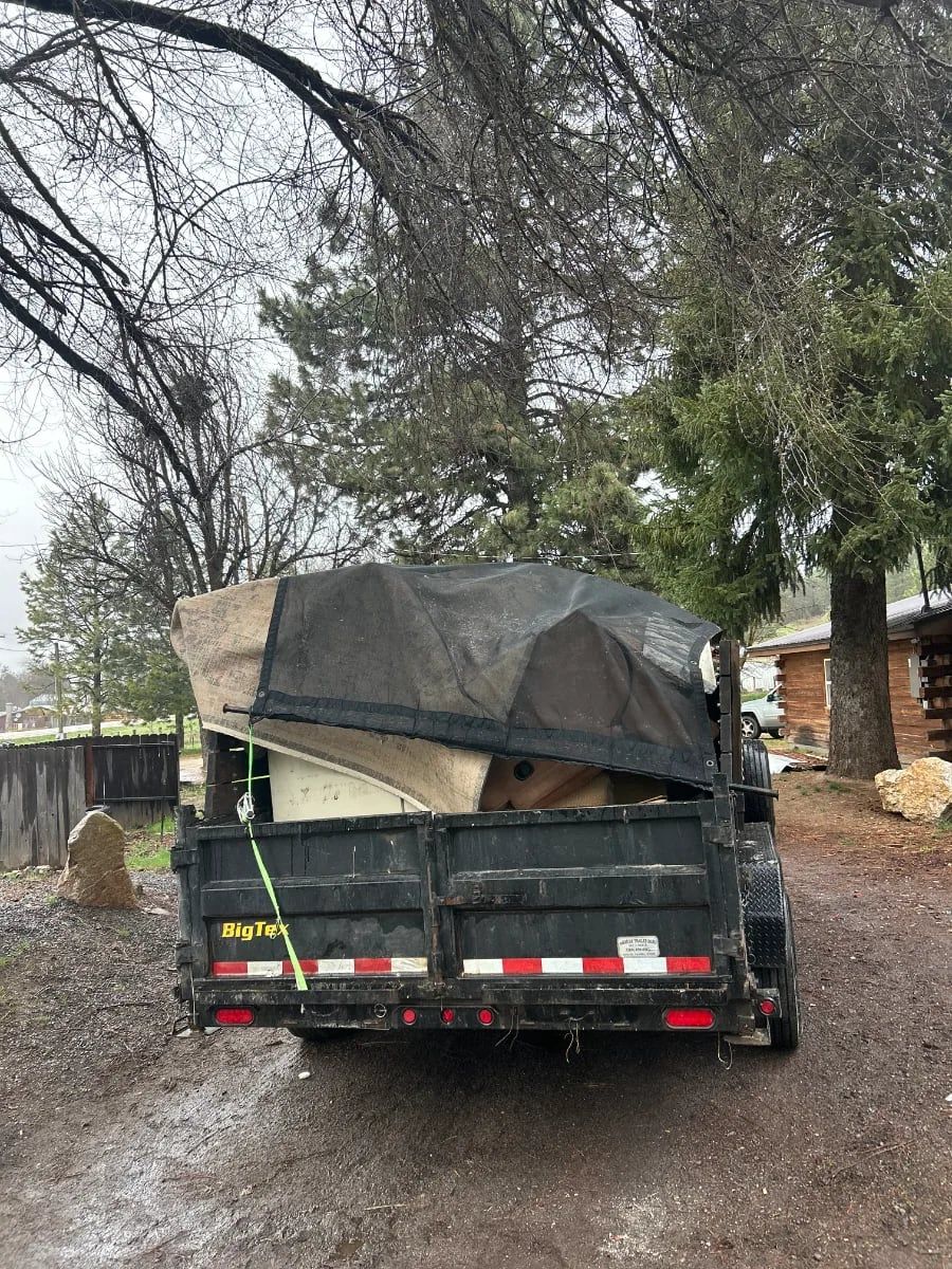 Tarped dump trailer loaded and ready to haul