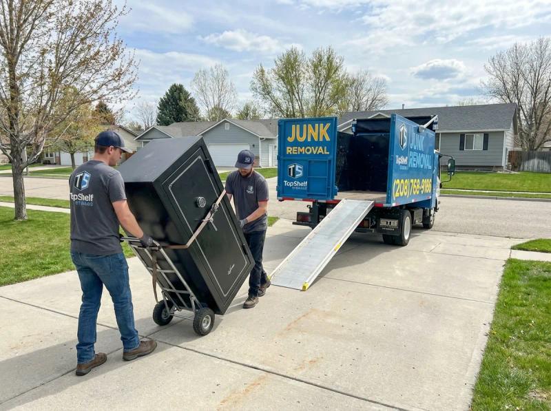 Top Shelf crew removing a gun safe from a residential property in Nampa Idaho