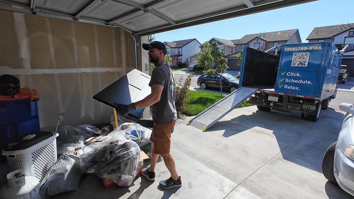 Garage cleared out by a home cleanout crew before a house sale in Boise Idaho