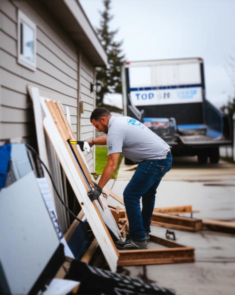 Shed tear-down in progress during a structure removal job in Boise Idaho