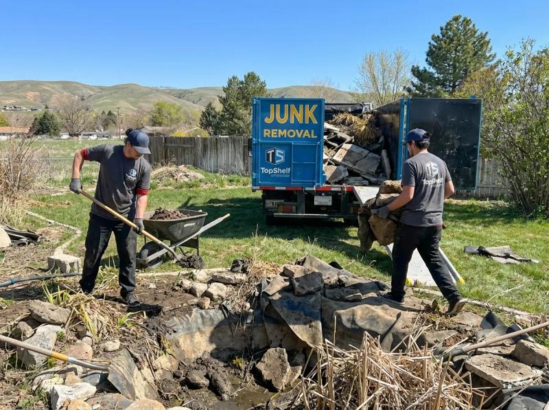 Professional pond demolition and debris removal by Top Shelf crew in Garden City Idaho