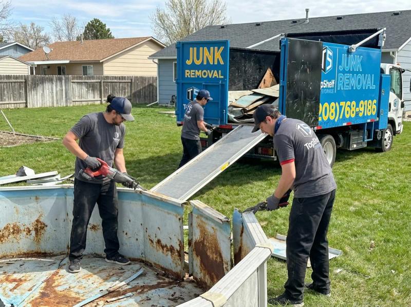 Pool removal company breaking up an inground pool in the Treasure Valley