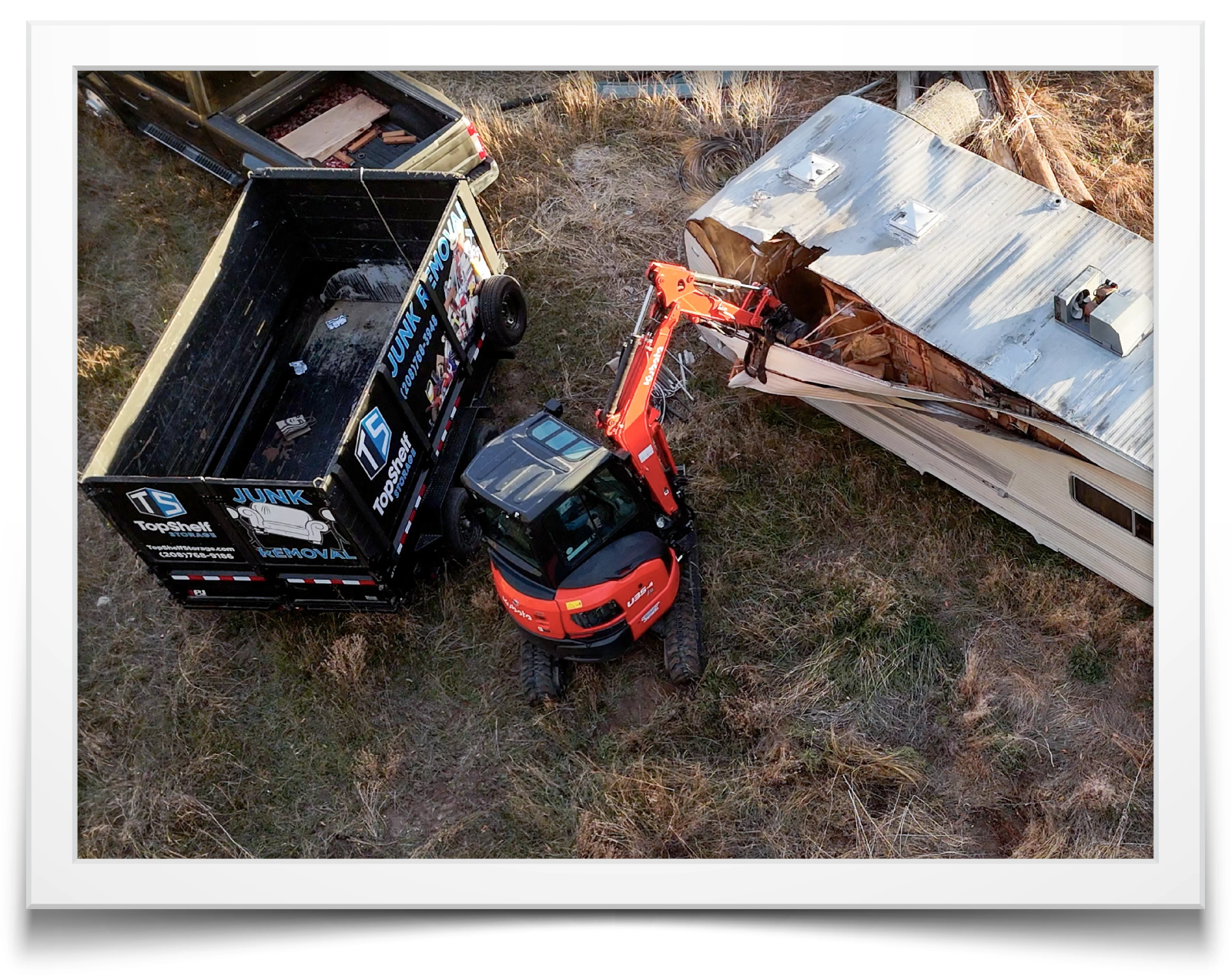 Demolition crew removing an old shed structure in Eagle Idaho - professional demo services